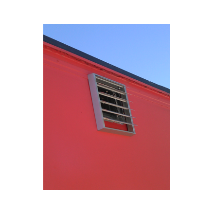 Front-facing outlet shutter